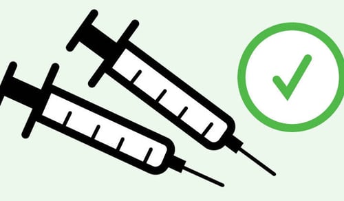 En grön cirkel med en svartvit linjeteckning av två system.